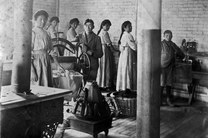 Mount Elgin, Ontario, laundry room. Clothes wringers, such as the one shown here, were a source of injury at a number of residential schools. The United Church of Canada Archives, 90.162P1173.