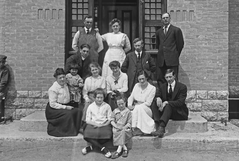 Staff outside the entrance of the Brandon, Manitoba, school in 1946. National Film Board of Canada. Photothèque, Library and Archives Canada, PA-048575.